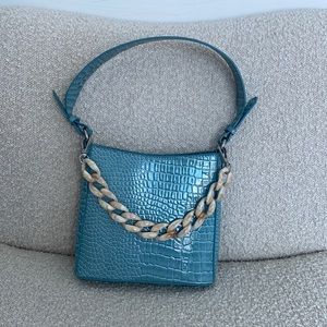 hvisk baby blue croc bag